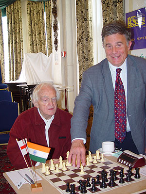 Roy Heppinstall, chief executive of the British Chess Federation makes the first move for IM Bob Wade (England 2)